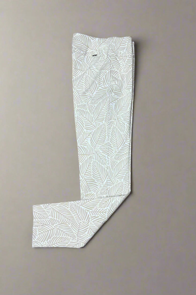 White pants with a subtle pattern on a beige background