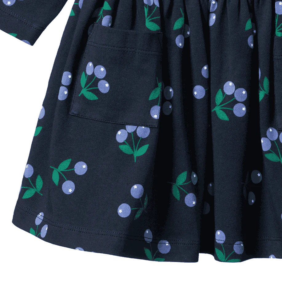 Black dress with blueberry pattern on a white background