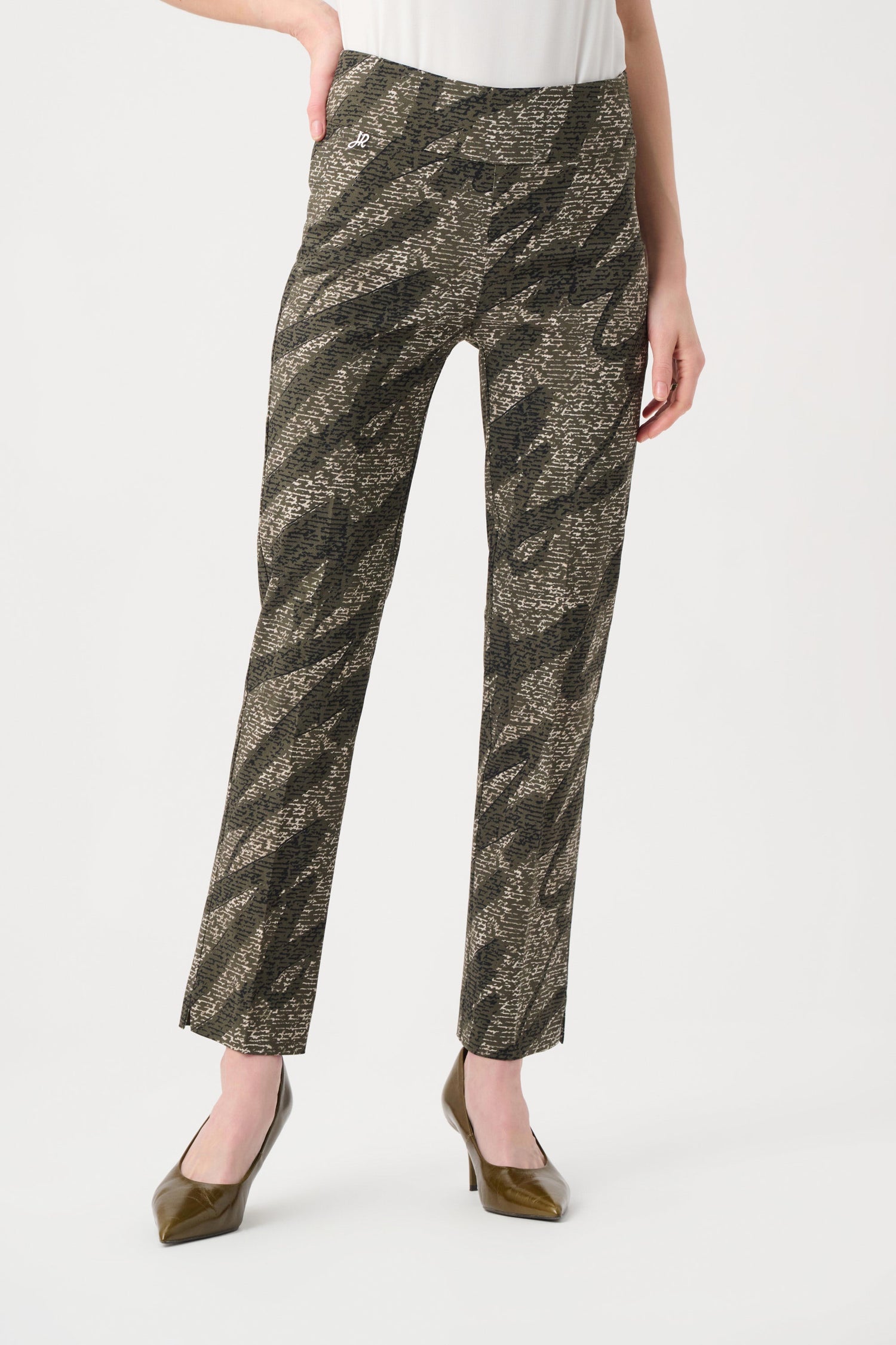 Patterned pants worn by a person on a white background