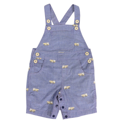 Blue denim overalls with bear pattern on a white background