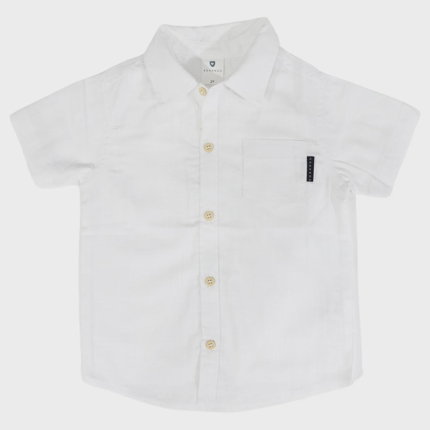 White short-sleeve shirt with buttons on a light gray background