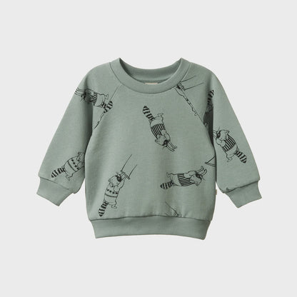 Green sweatshirt with black illustrations on a light gray background