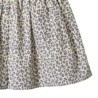 Floral patterned fabric with purple flowers on a white background