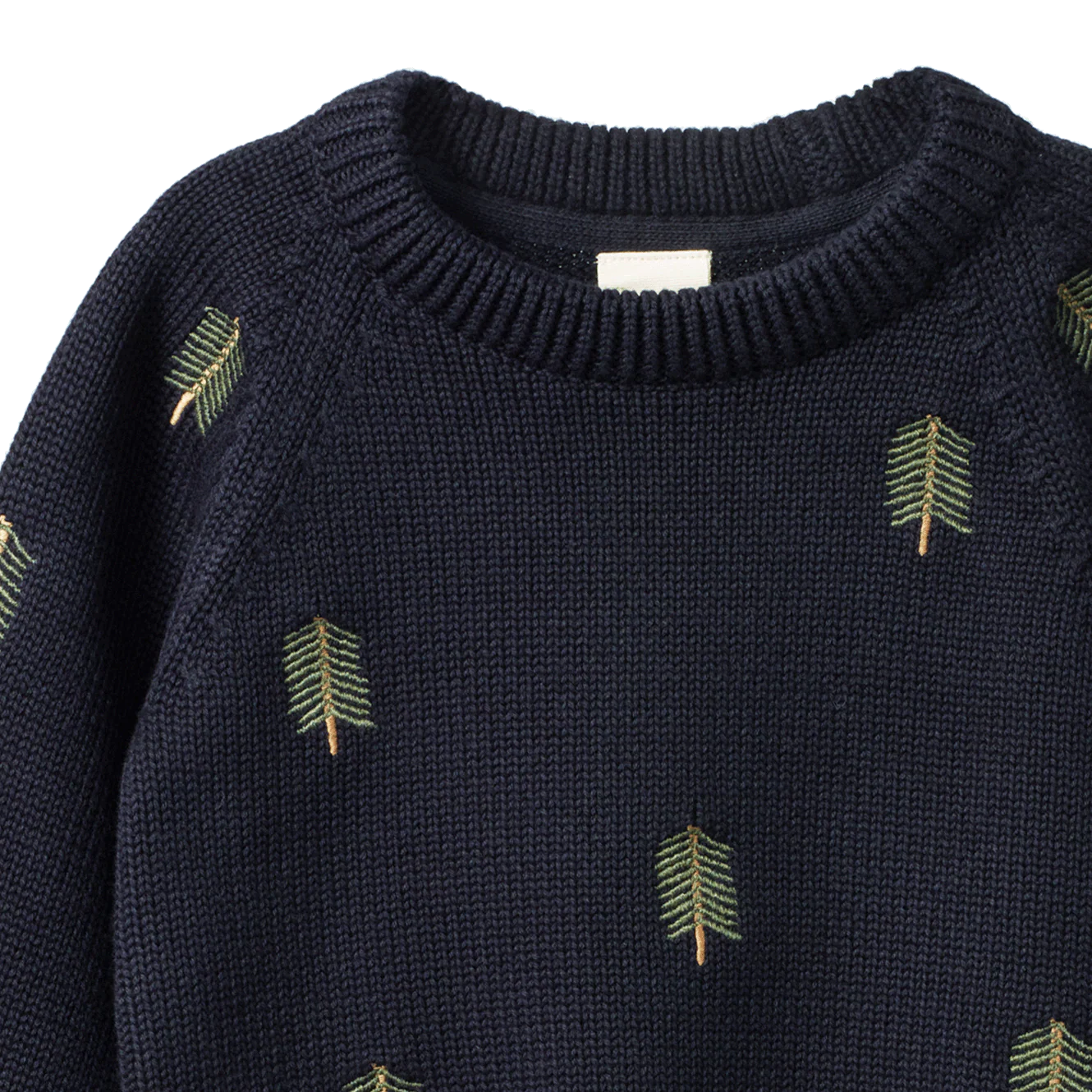 Navy sweater with green leaf patterns on a white background