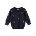 Navy blue sweater with green leaf patterns on a white background