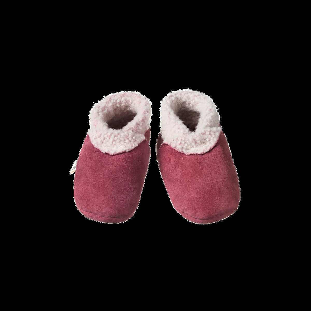 Pair of pink baby booties with white fur trim on a black background