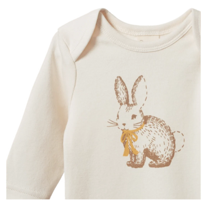 Baby onesie with a printed bunny design on a white background