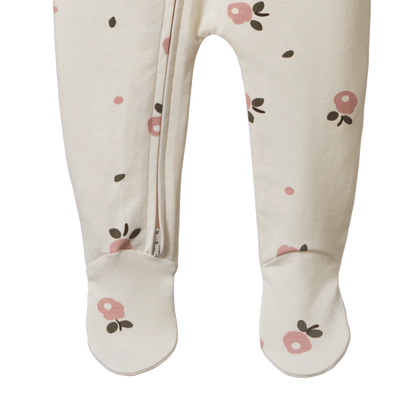 Baby onesie with floral pattern on a white background