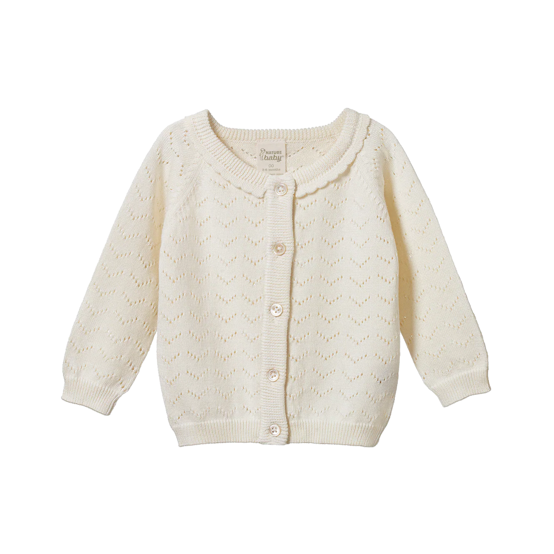 Cream-colored baby cardigan on a white background