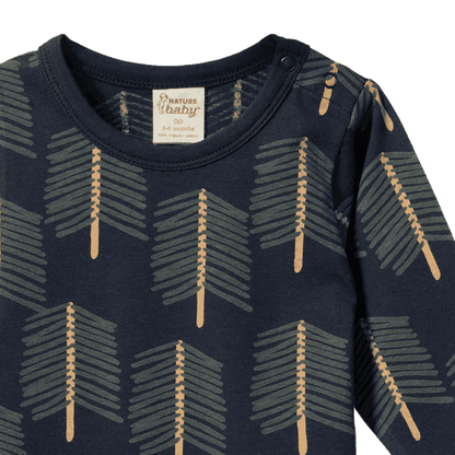 Navy blue baby onesie with arrow pattern and &