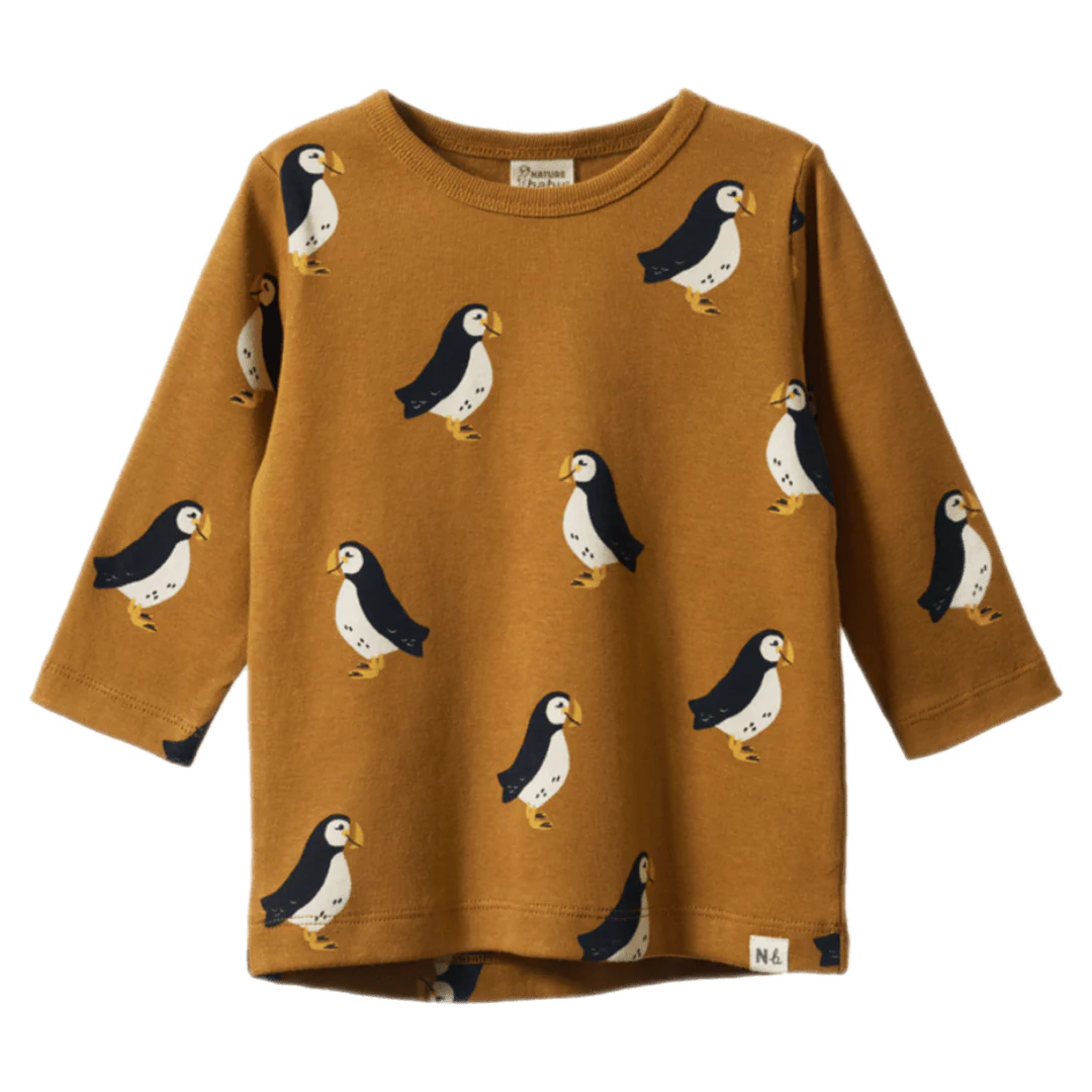 Brown sweater with penguin pattern on a white background