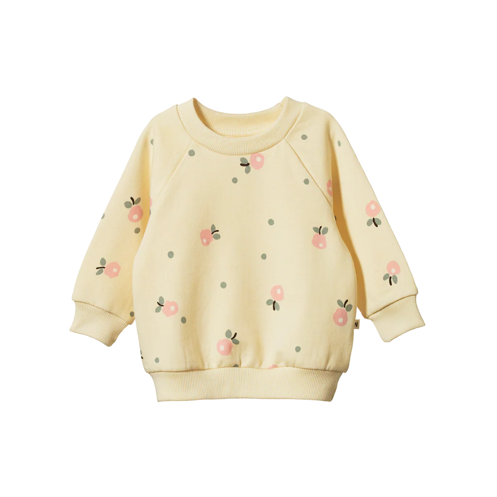 Yellow sweatshirt with floral patterns on a white background