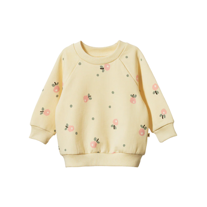 Yellow sweatshirt with floral patterns on a white background