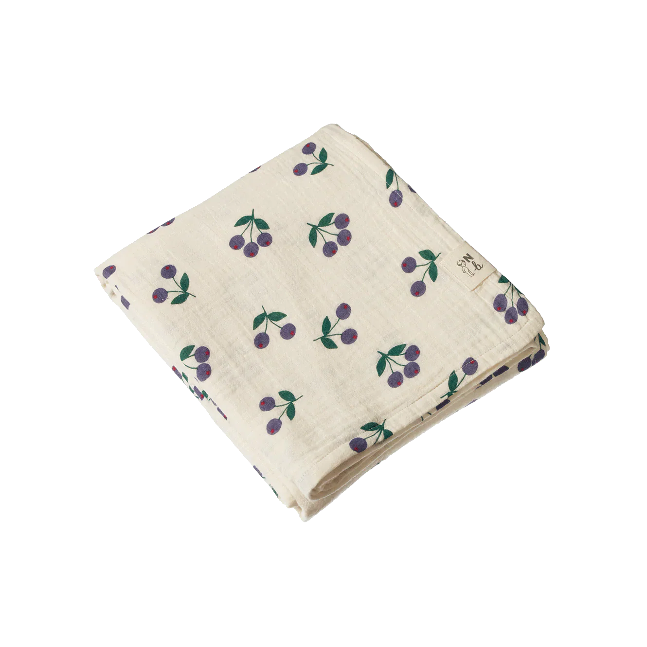 Folded fabric with cherry pattern on a white background