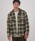 Man wearing a green and beige plaid jacket on a white background