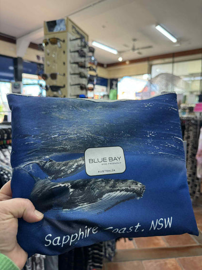 Blue towel in bag with whale design and &