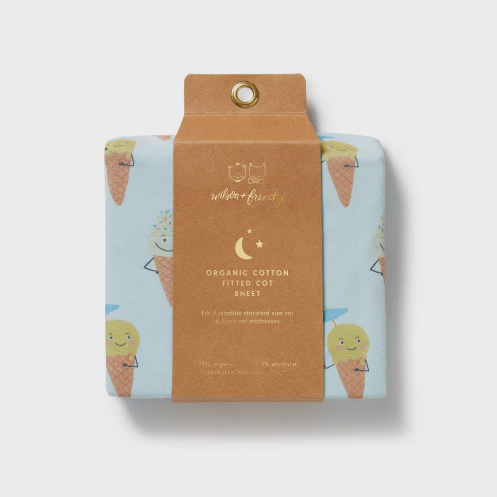 Organic cotton fitted cot sheet packaging with ice cream cone design on a light gray background