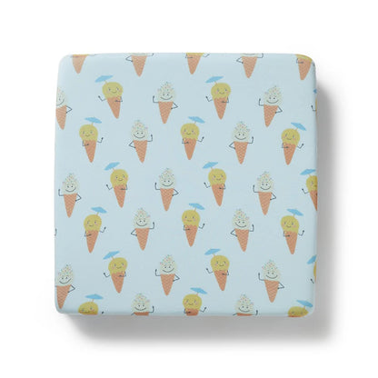 Fitted sheet with ice cream cone pattern on a light blue background
