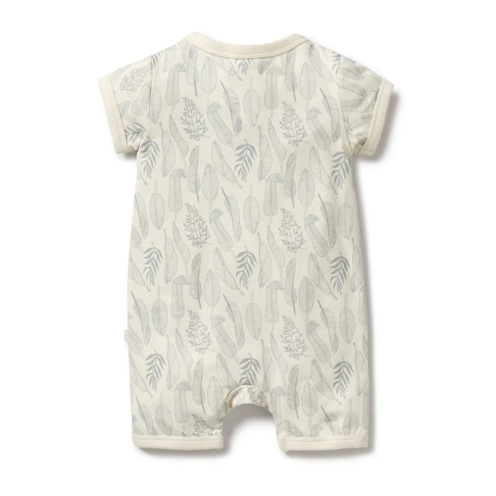Baby romper with leaf pattern on a white background