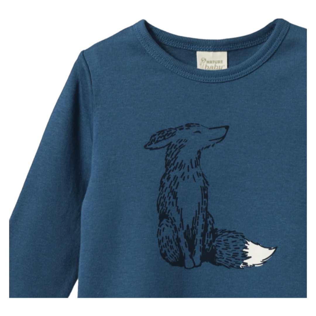 Blue long-sleeve shirt with a fox graphic on a white background