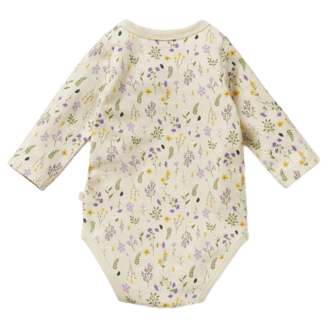 Baby onesie with floral pattern on a white background