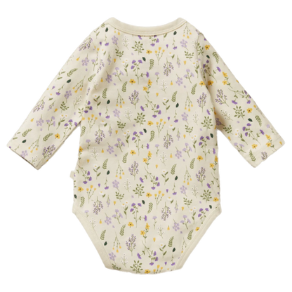 Baby onesie with floral pattern on a white background